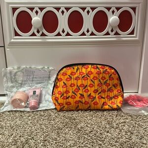 Clinique 4 piece travel gift set - bag , hair tie, cleanser, moisture surge